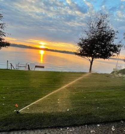 irrigation on the lake with sunset view