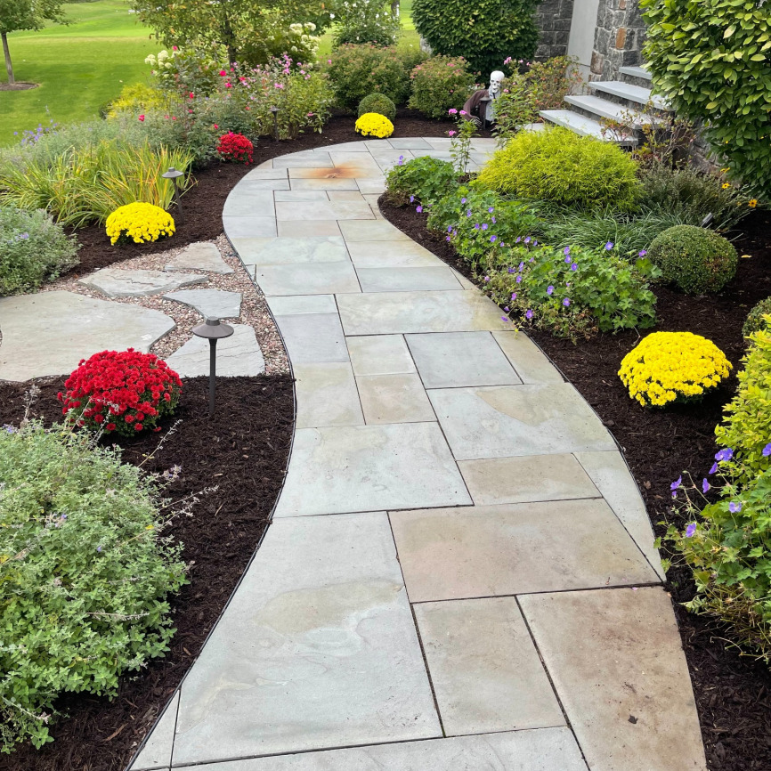 large paver walkway and landscaping